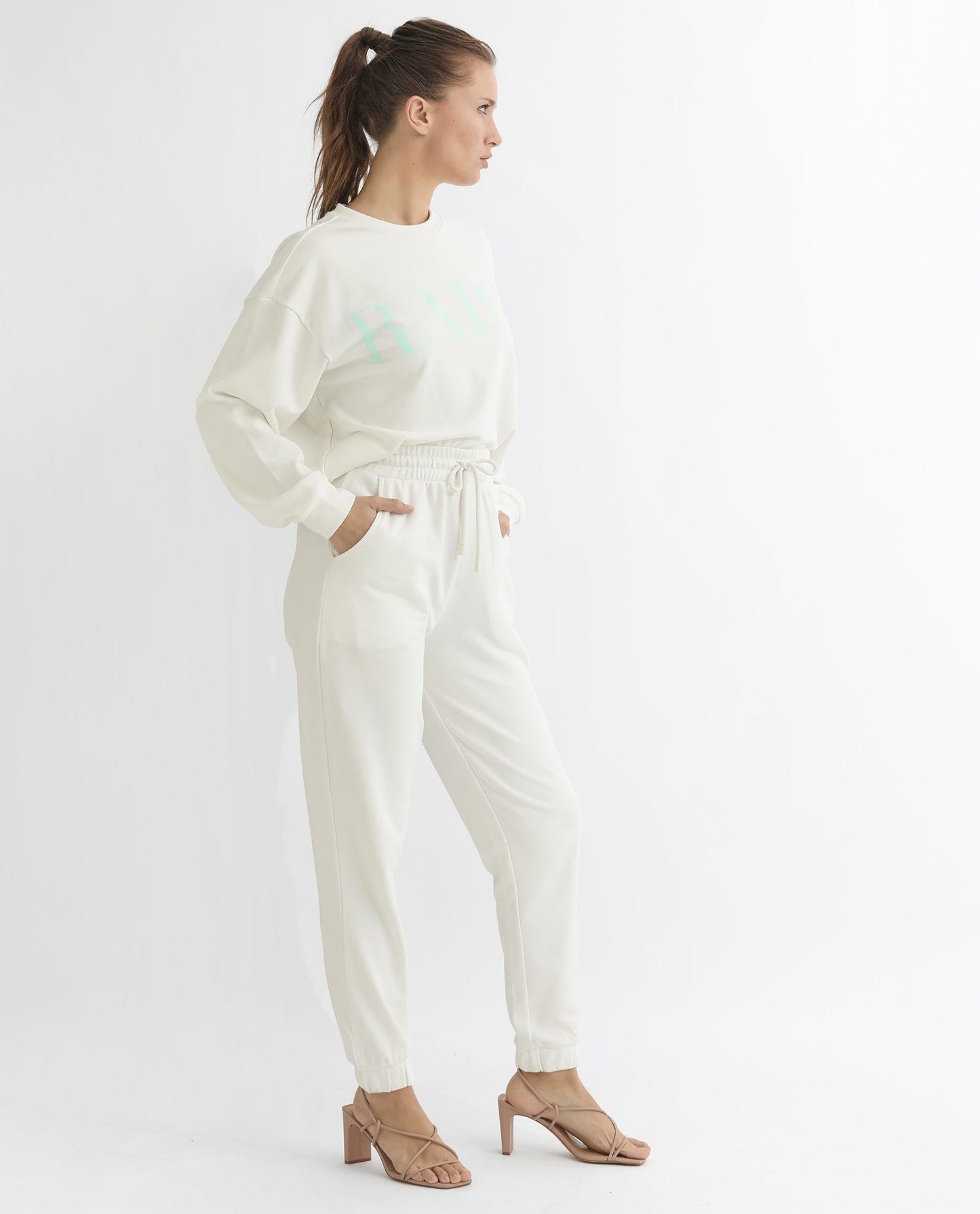 Rareism Articale Women Terac T Off White Poly Cotton Fabric Drawstring Closure Regular Fit Plain Ankle Length Track Pant