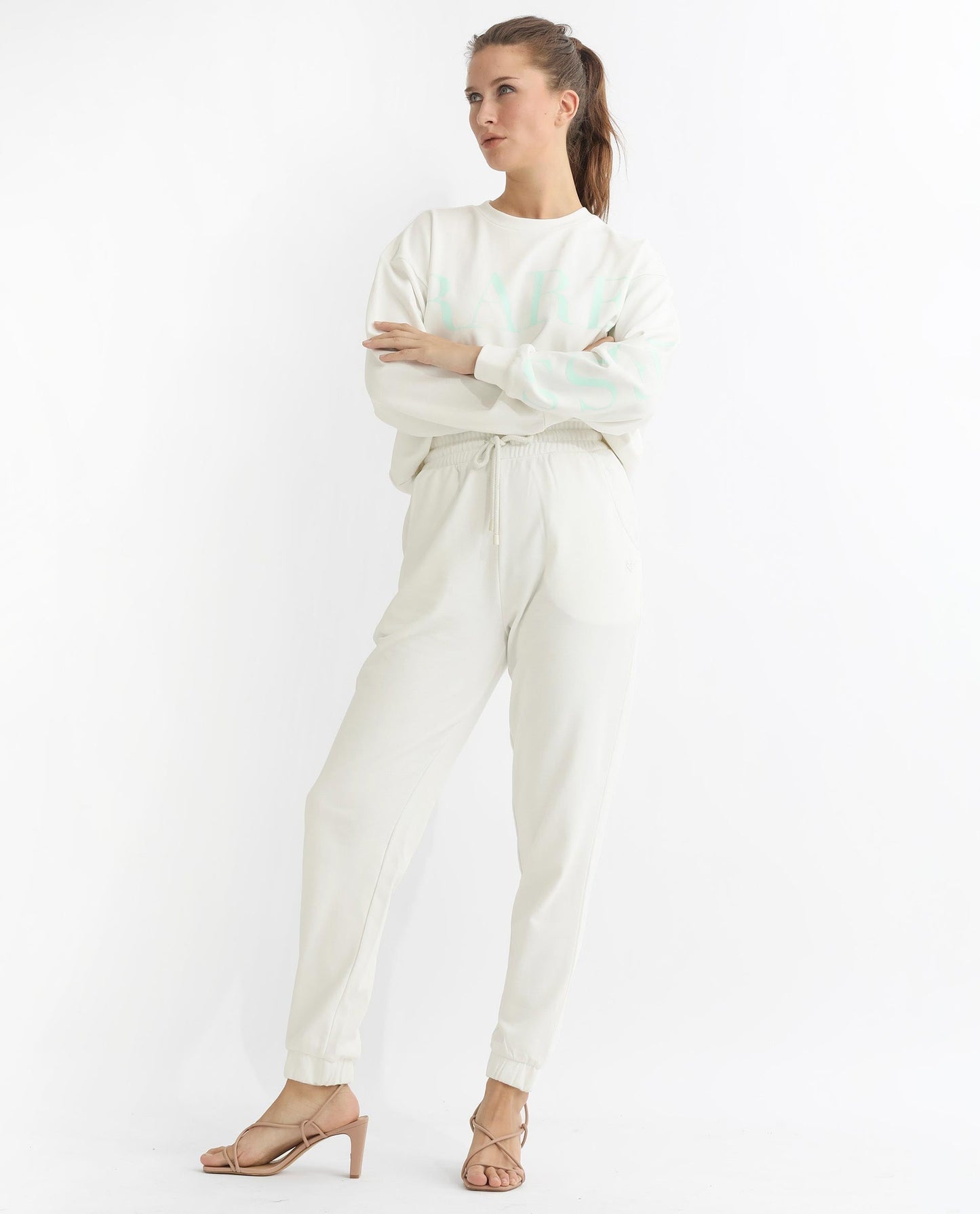 Rareism Articale Women Terac T Off White Poly Cotton Fabric Drawstring Closure Regular Fit Plain Ankle Length Track Pant